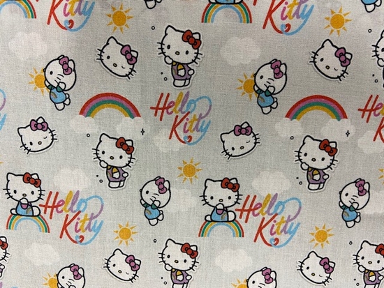 Tissu coton Hello Kitty fond gris