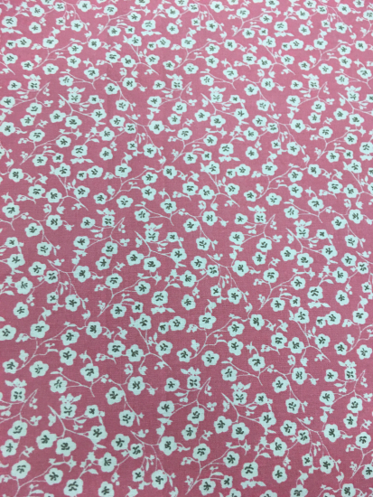 Tissu petites fleurs fond rose