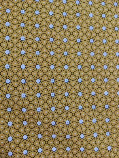 Tissu géométrique étoiles fond moutarde
