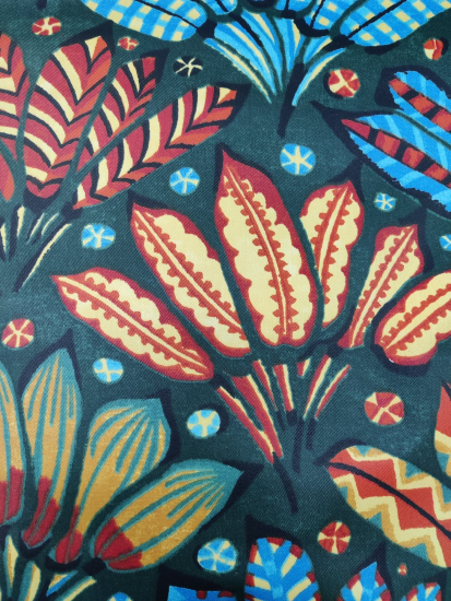 Tissu coton enduit feuilles multicolores sur fond vert foncé