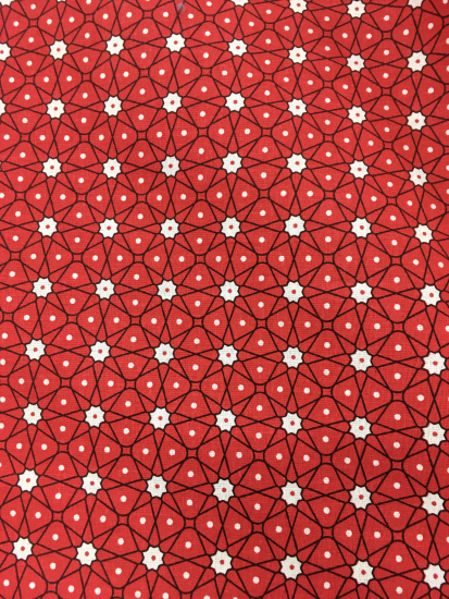 Tissu géométrique étoiles fond rouge