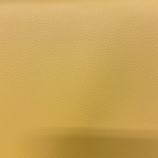 Tissu simili cuir jaune moutarde 